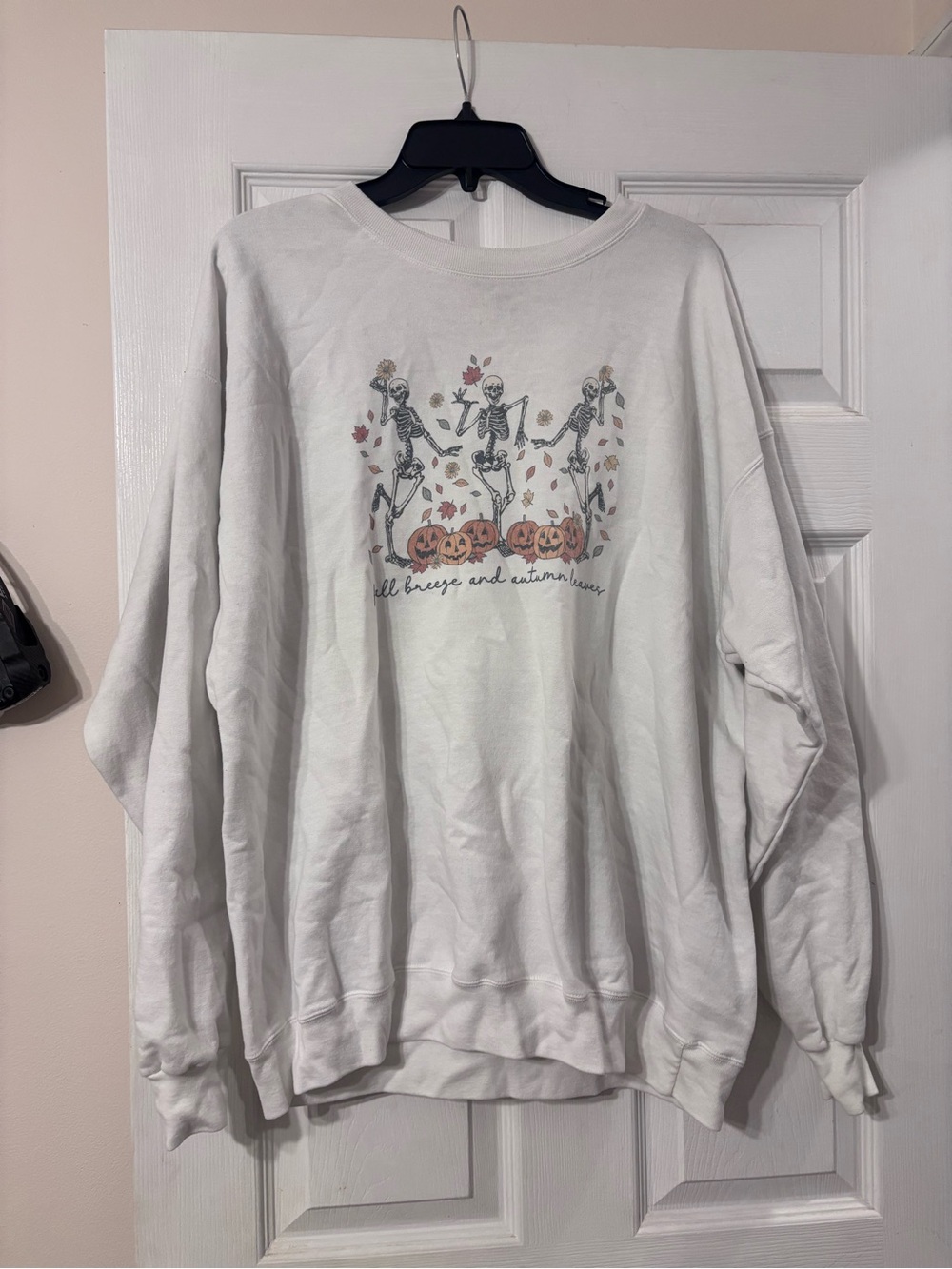 White Crewneck Sweatshirt with Dancing Skeleton & Pumpkin Graphic